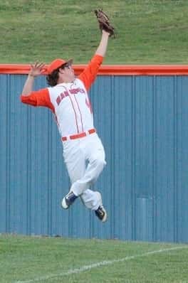 Right fielder Dylan Greenfield got airborne to make a nice grab near the fence against McCracken County.