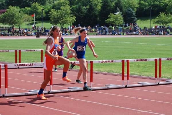Sophie Galloway on her way to a first place finish at the Middle School State Track Championship in the 100 meter hurdles.