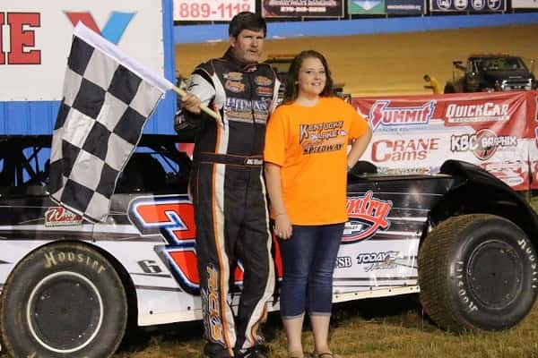 Troy English and KLMS trophy girl Hannah Morrison in victory lane.