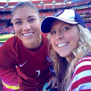 Savana with USA goalkeeper Hope Solo, in St. Louis.