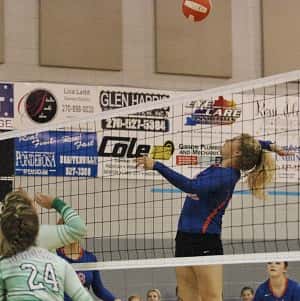 Sydney Nelson with the hit at the net in the Lady Marshals 3-1 win.