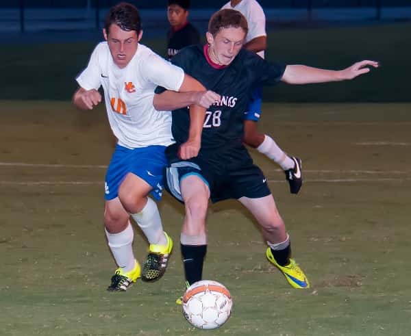 Cole Jewell and McCracken County's Jaxon Allard battle for ball control in the Marshals 2-1 win Tuesday. Photo by Bill Murphy at billmurphyphotography.com.