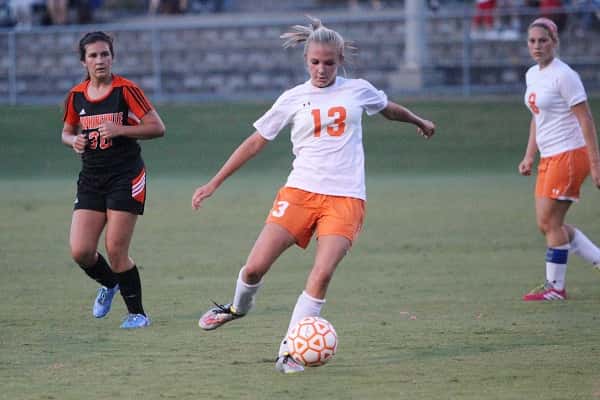Kylee Crass in the midfield working the ball to the front line.