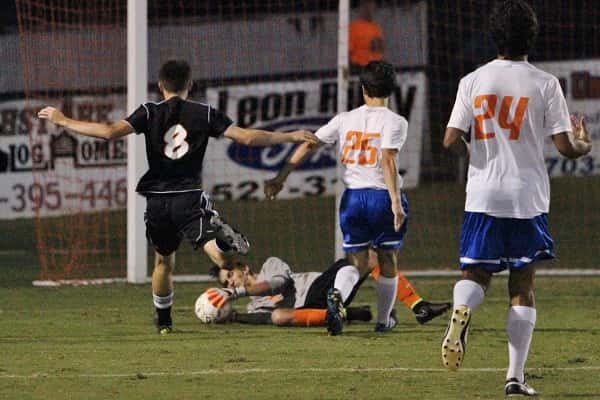 Marshall keeper Keagen Watkins coming up with the save against Hopkinsville.