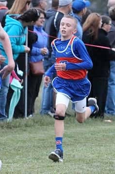 Ethan McCarty took first among 152 runners in the middle school race.
