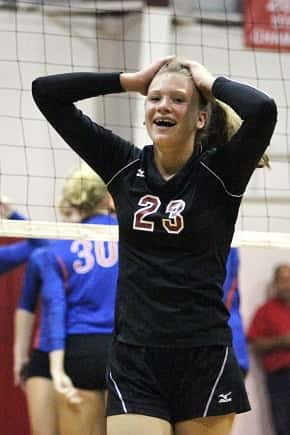 Abigail Cima reacts to a net violation in the fifth game of the district championship.