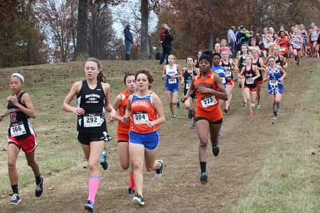 Marshall's Spring Dolbee at the front of the race near the start of the girl's Class 3A race.