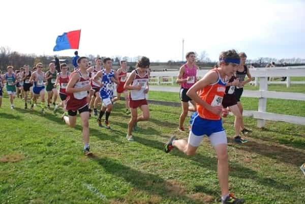 Marshall County runner Matt Ray (orange jersey) competing in the Class 3A State Championships.
