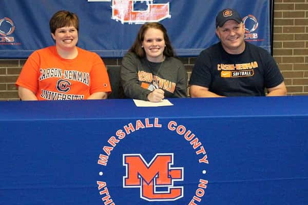 Abby Fiessinger, along with her parents Heather and Jason, signed to play softball for Carson-Newman University.