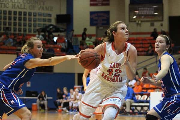 Hannah Langhi heading to the goal in the Lady Marshals 48-30 win over Massac County. Langhi was selected MVP of the game.
