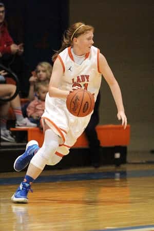Miyah Davis dribbling around a pick in the Lady Marshals Saturday morning Hoopfest game.