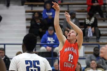 D.J. Pigg watching his shot on his way to lead the Marshals with 19 points.