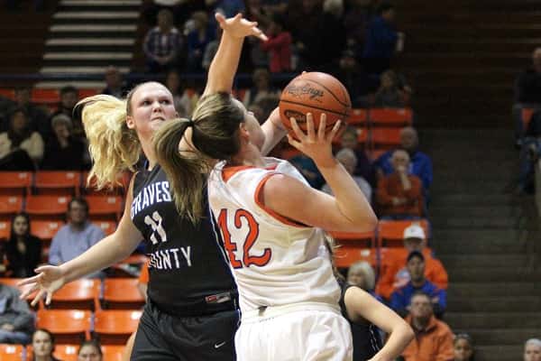 Hannah Langhi won the battle in the paint against Graves' defender Cassidy Sheppard in the Lady Marshals win.