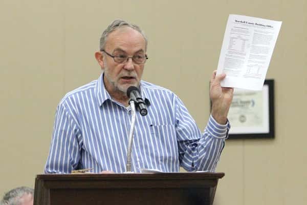 Bill Gibson presented a proposed change to a rate fee applied to post frame storage building inspections.
