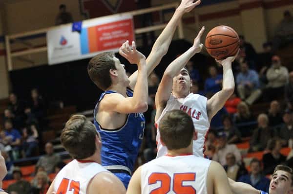 Aaron Reed battled against 6'10" Chris Vogt in the Marshals loss to Graves County last week.
