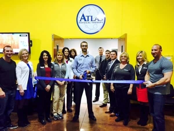 Photo L to R: Billy Georgio, Mollie Sawyer, Amy Grizzard, Christie Merritt, Leslie Lovett, Ledonia Williamson, Bryan Krueger-Owner (w/scissors), Cole Arnett, Jacob Puckett, Steve Fisk, Cathey Sharpe, Amy Peal, and P.G. Georgio