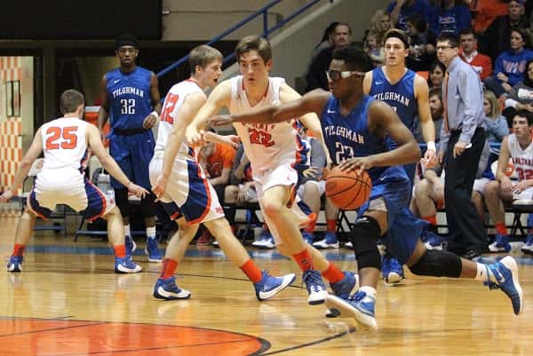 Skyler Smith sticks close to Tilghman's Rodriguez Thomas.