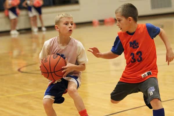 Playing in the 3rd grade boy's All-Star game were players Cashies Henton (White) and Ty Redden (33).