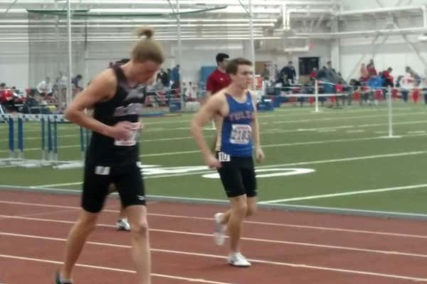 Robert Blankenship on the track for the University of Tulsa warming up.