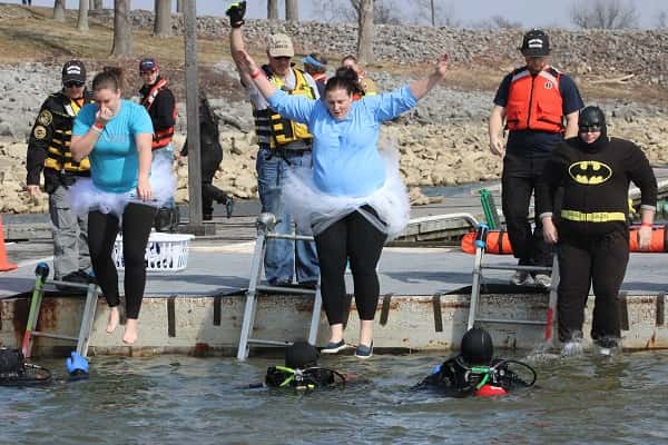 Plungers enjoyed warm temperatures but met with chilly waters at Saturday's Western Kentucky Polar Plunge.