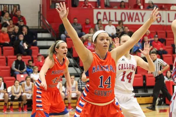 The Lady Marshals against Calloway County on February 12th, hope to win their 3rd game this season against the Lady Lakers Tuesday in the District Tournament. Pictured: Lexee Miller (14), Hannah Langhi (42)