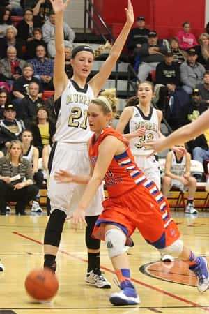 Nikki Fehrenbacher, dribbling around Murray's Maddie Waldrop, led the Lady Marshals with 14 points.