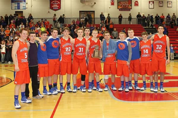 A disappointed Marshall team accepts their 4th District runner-up trophy.