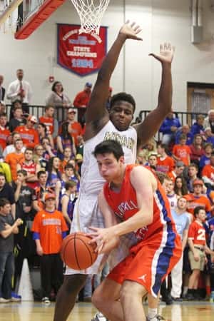 Matthew French, guarded by Tre Hornbuckle, scored 8 points for the Marshals.