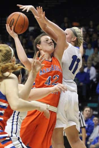 Hannah Langhi, guarded by Lady Eagle Cassidy Sheppard, led the Lady Marshals with 10 points and 8 rebounds.