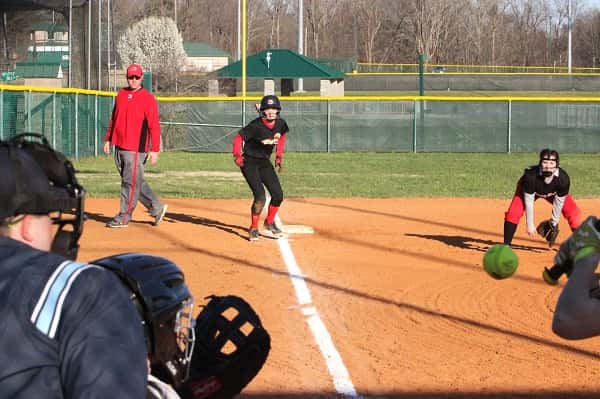 Amber Shelley watching the pitch from 3rd base during a recent game against Mayfield.