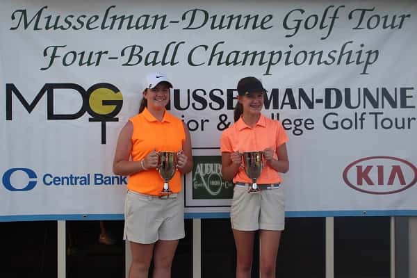 Savannah Howell (left) and Katie Hanni won the girl's 12-14 age division.