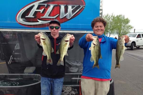 Barrett Washburn (left) and Peyton Porter show off their catch that earned them a spot in the KHSAA State Bass Fishing Tournament.