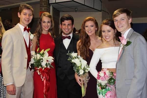 Before the start of Grand March (L-R) Colton Adrian, Hannah Oswalt, Kensley Bowerman, Karly King, Shannon Powell and Trevor Fisk take a moment for a picture.