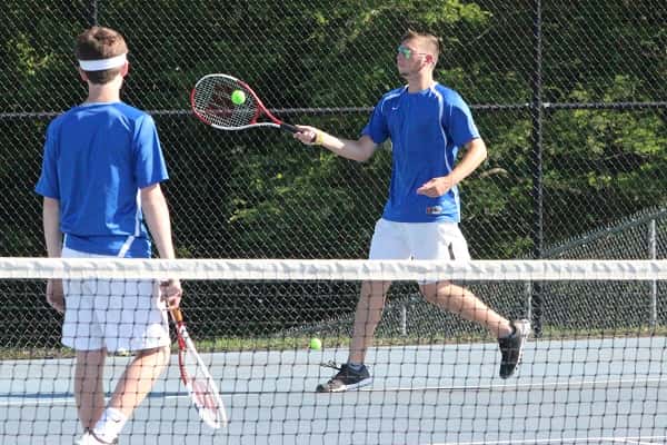 Blake Sandlin returns a serve last week in doubles with partner Hayden Jaco in their 9-8 tie-breaker loss to Hale and Carrico.