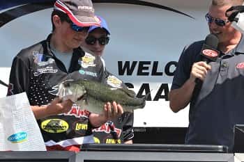 McCracken County's Daniel Schroeder shows off the 5-11 Big Bass they caught on Kentucky Lake at Friday's weigh-in.