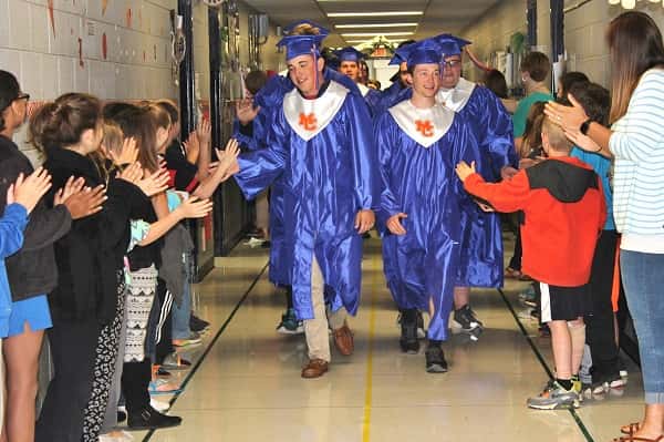 Class of 2016 seniors who attended Sharpe Elementary School were greeting by cheering students during their inspirational walk through the halls.