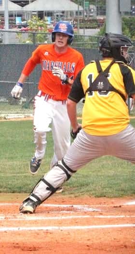 Justice Beal heading to home plate to score a run in the 1st inning for the Marshals.