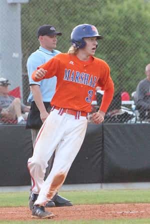 Jackson Beal crossed home plate to score the 2nd of his 2 runs in the Marshals 5-1 win over Hickman County.