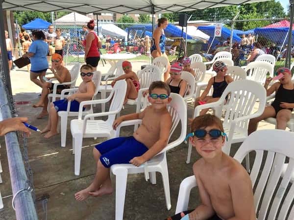 Swimmers wait in the staging area before their event at the Anna Invitational.