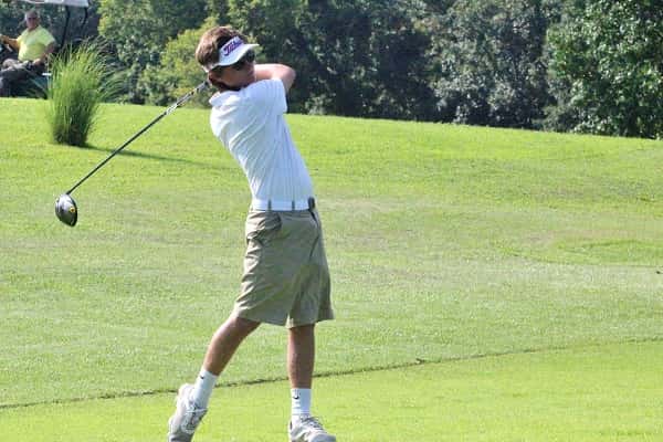 Drew Putteet watches his tee shot Thursday off the first hole at Calvert City Country Club.