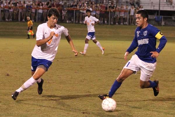Nate Moore chases down Rodrigo Garcia in a heated Marshall County-Graves County district battle.