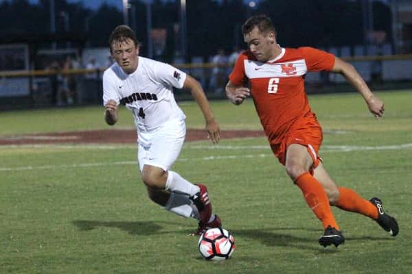 Dawson Jolley controls the ball, defended by McCracken's Owen Lacey, in the Marshals 4-3 win over the Mustangs Tuesday.