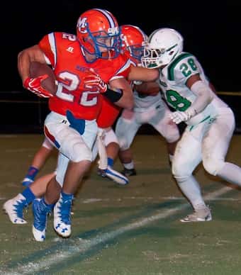 Mason Green (22) rushed for almost 200 yards in the Marshals home opener Friday against Ballard Memorial.