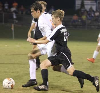 Cameron Ives taking care of the ball near mid-field in the Marshals district win over Murray.