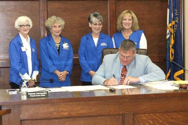 Members of the Marshall County Hospital Auxiliary for the Proclamation signing by Judge/Executive Kevin Neal.