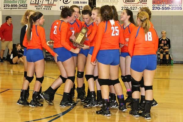 The Lady Marshals volleyball team celebrating their District Championship. They are playing this week in the 1st Region Tournament at McCracken County.