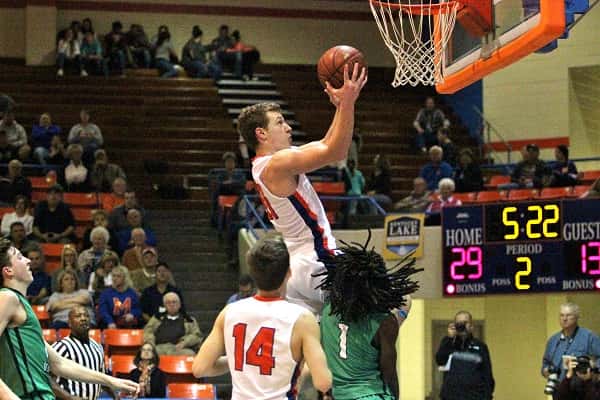 Dylan Walters spent a lot of time up in the air on his way to 23 points, in the Marshals home opener against Ballard Memorial.