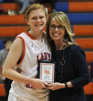 Miyah Davis was presented with the game MVP award from Angie Fisk.