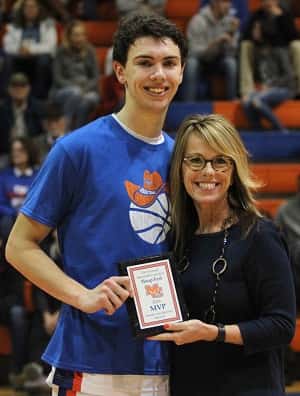 Game MVP honors went to Aaron Reed, presented to him by Angie Fisk.