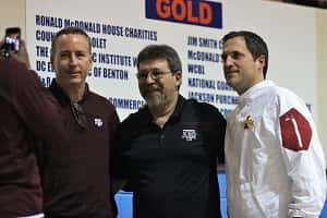 Former Murray State coaches Billy Kennedy (left) and Steve Prohm (right) scout talent at this year's Hoopfest. Kennedy is head coach at Texas A & M and Prohm at Iowa State.